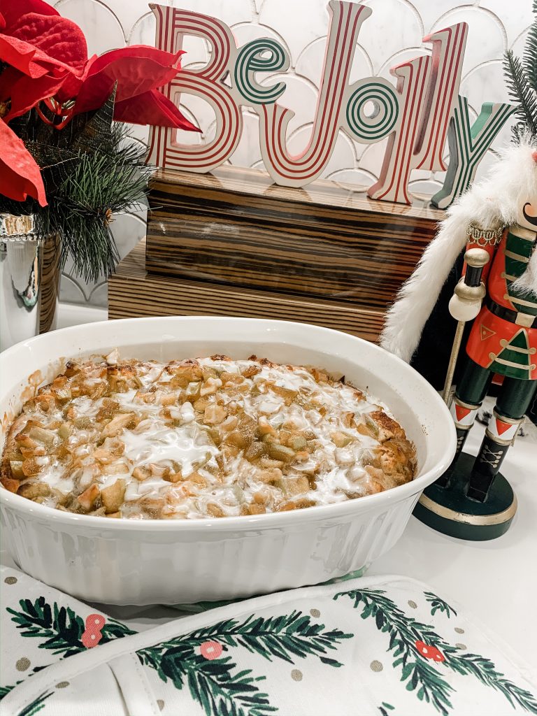 Good Eats | Apple Pie Bake by popular Nashville lifestyle blog, Hello Happiness: image of an apple pie bake in a Corningware dish next to a Kate Spade New York All In Good Taste Pine Needles, 3 Piece Holiday Kitchen Set and a Target Wondershop 14" x 3.5" Traditional Nutcracker.