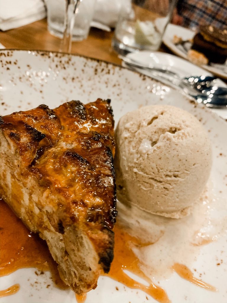 Meet Me for a Weekend in St. Louis | The Perfect Family Getaway by popular travel blog, Hello Happiness: image of A la Mode bread pudding at the Chase Club. 
