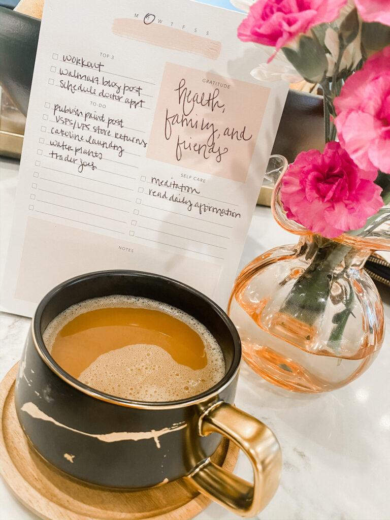 Amazon Favorites by popular Nashville life and style blog, Hello Happiness: image of a Daily To-Do Notepad and Marble Coffee Cup + Wood Saucer. 
