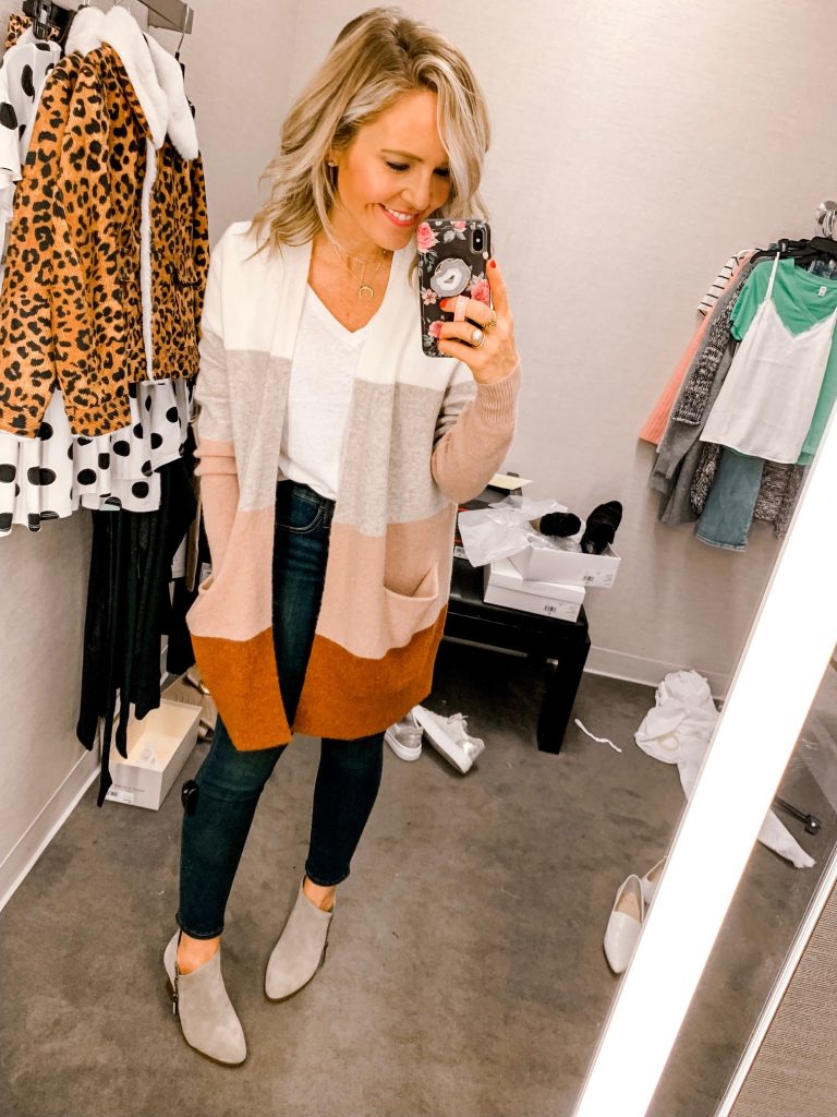 It's LIVE, The 2019 Nordstrom Anniversary Sale... First Look Favs + Dressing Room Diaries by popular Nashville fashion blog, Hello Happiness: image of a woman standing in a Nordstrom dressing room and wearing a Madewell Ryder Stripe Cardigan and BP V-Neck Tee in White. 