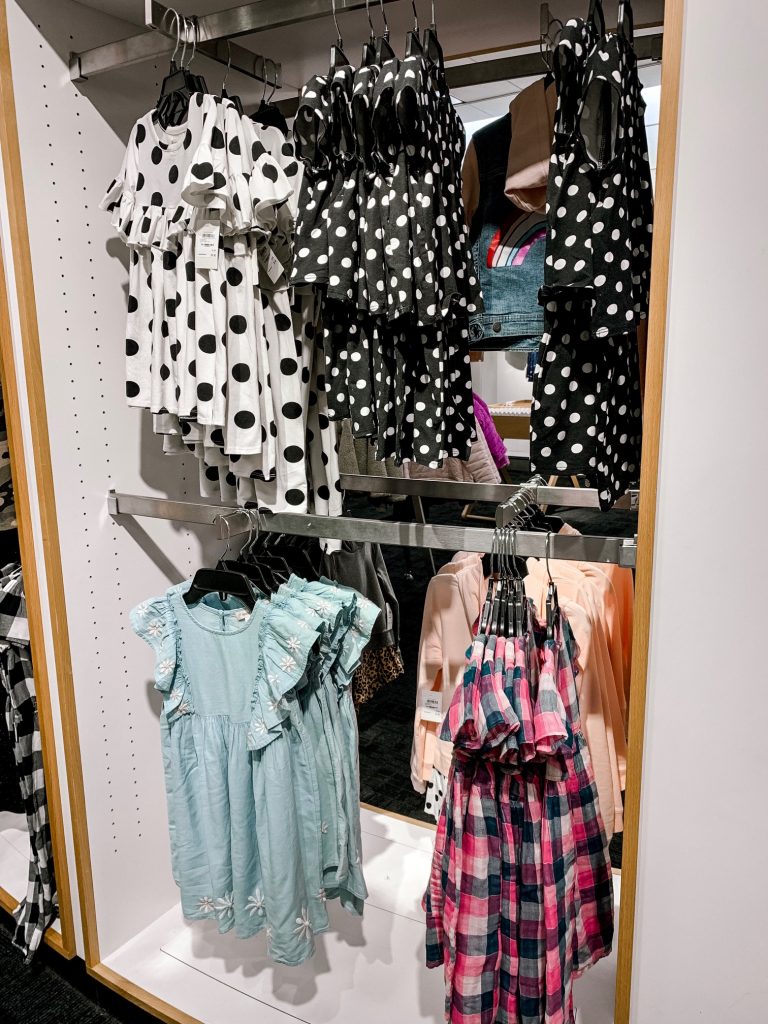 It's LIVE, The 2019 Nordstrom Anniversary Sale... First Look Favs + Dressing Room Diaries by popular Nashville fashion blog, Hello Happiness: image of various women's shirts hanging in a Nordstrom clothing display.