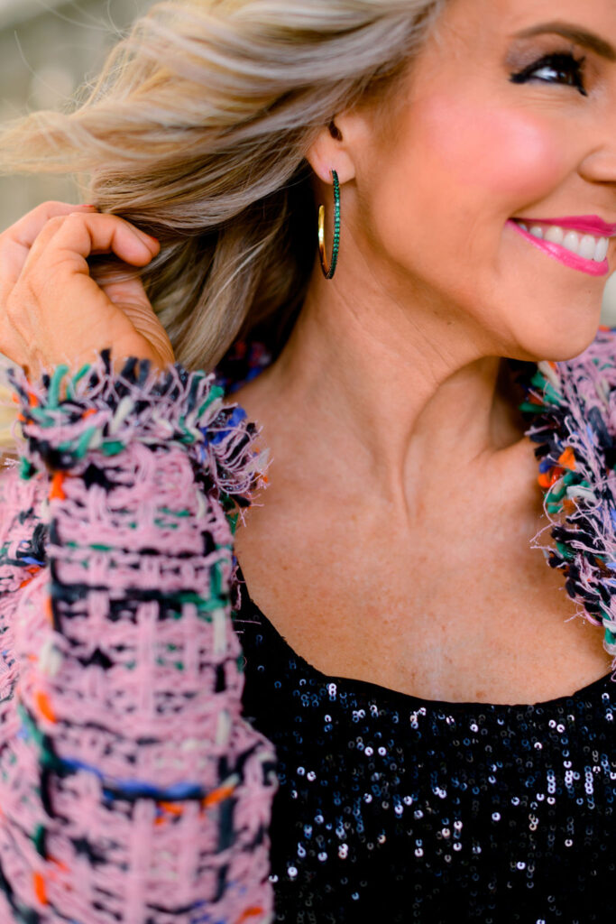 Accessory Concierge by popular Nashville fashion blog, Hello Happiness: image of Natasha Stoneking wearing the Accessory Concierge Emerald CZ hoop earrings, black sparkle top, Check Tweed Jacket + Sequin Cami Top