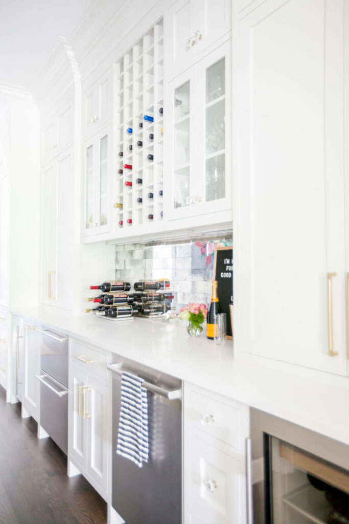 Home Paint Colors by popular Nashville life and style blog, Hello Happiness: image of butler's pantry cabinets painted in Sherwin Williams Pure White  7005, Satin.