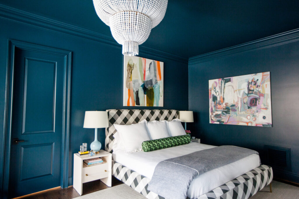 Home Paint Colors by popular Nashville life and style blog, Hello Happiness: image of a Master Bedroom with a white beed chandelier painted in Farrow & Ball Hague Blue No. 30.