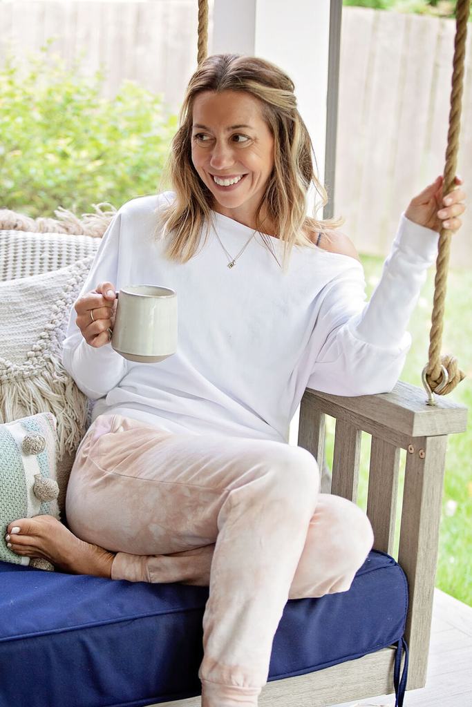 Gibson Clothing by popular Nashville fashion blog, Hello Happiness: image of a woman wearing a Gibson Look x The Motherchic Cuddle Me Off Shoulder Pullover.