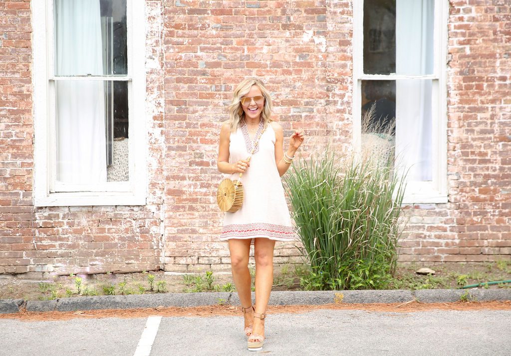 Summer Capsule Wardrobe featured by top US fashion blog Hello! Happiness; Image of a woman wearing Social Threads halter dress.