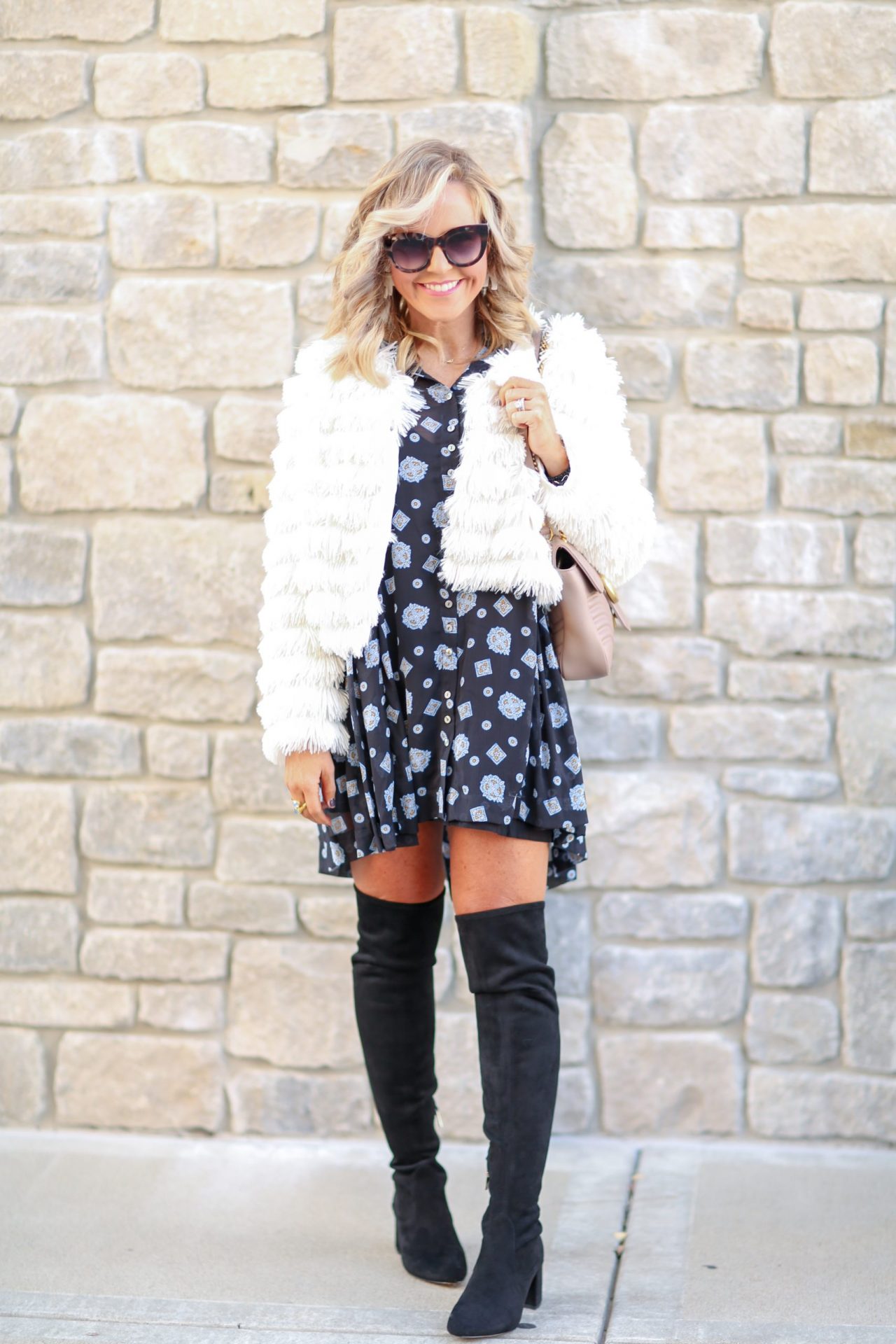 Cute Winter Shoes featured by top US fashion blog, Hello! Happiness: image of a woman wearing Jayne Over the Knees boots