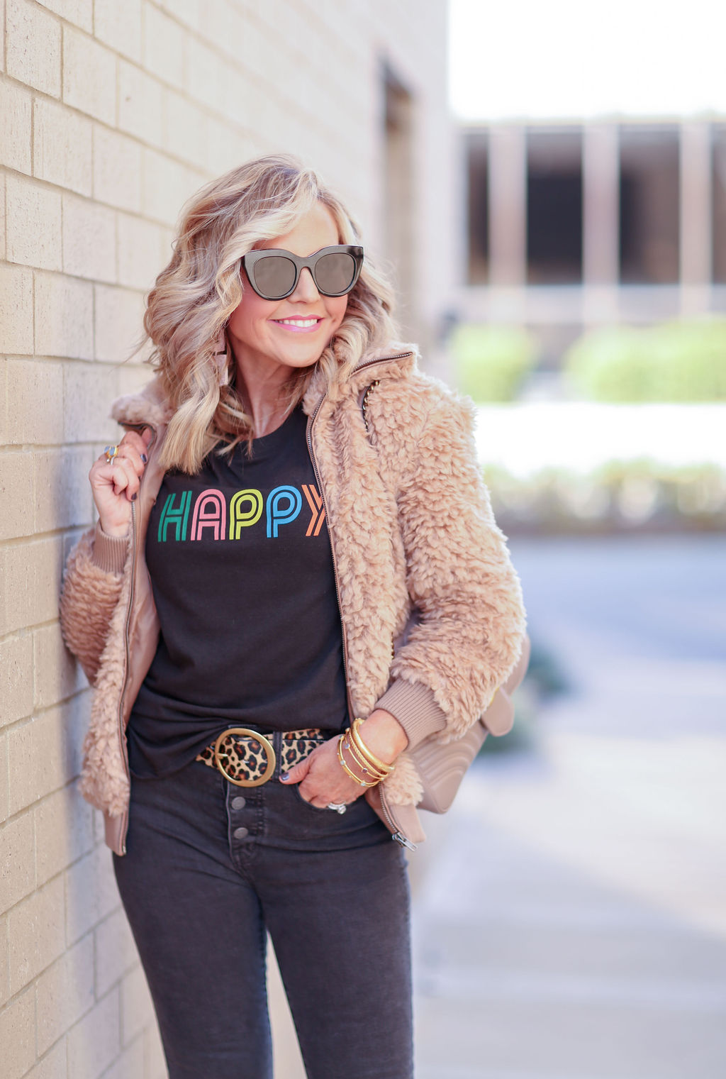 Cute Graphic Tees featured by top US fashion blog, Hello! Happiness: image of a woman wearing a Happy graphic tee