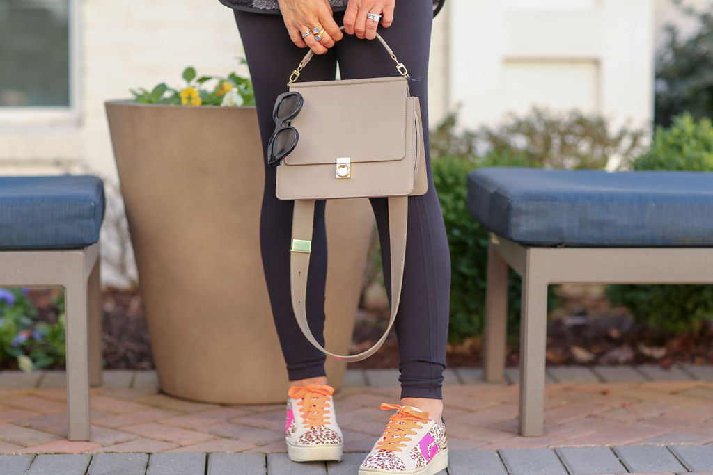 Cute Winter Shoes  featured by top US fashion blog, Hello! Happiness: image of a woman wearing Yvett sneakers