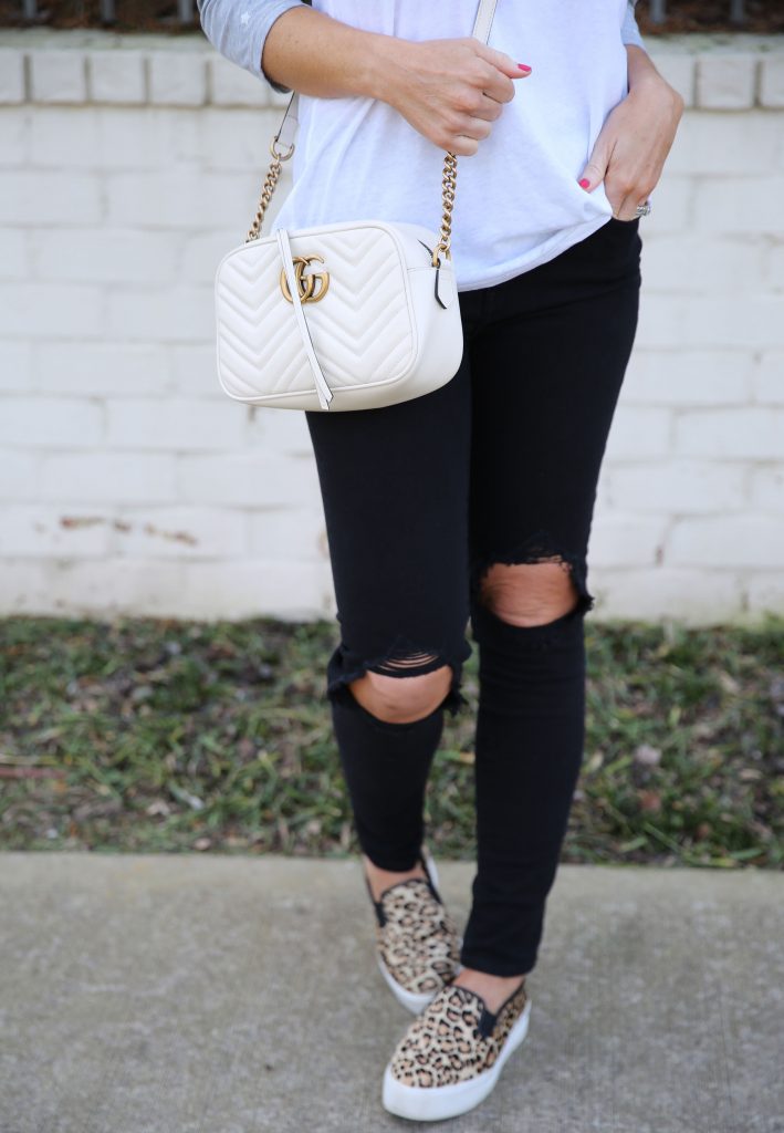 Leopard Print favorites featured by top US fashion blog, Hello Happiness: image of a woman wearing leopard  print sneakers