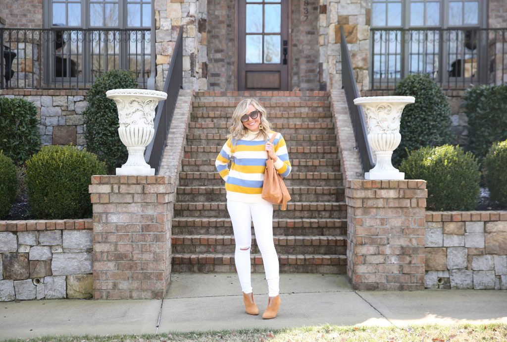 Best Small Shops featured by top US life and style blog Hello! Happiness; Image of a woman wearing a Gunny Sack and Co striped sweater, Vince Camuto booties and white skinny jeans.