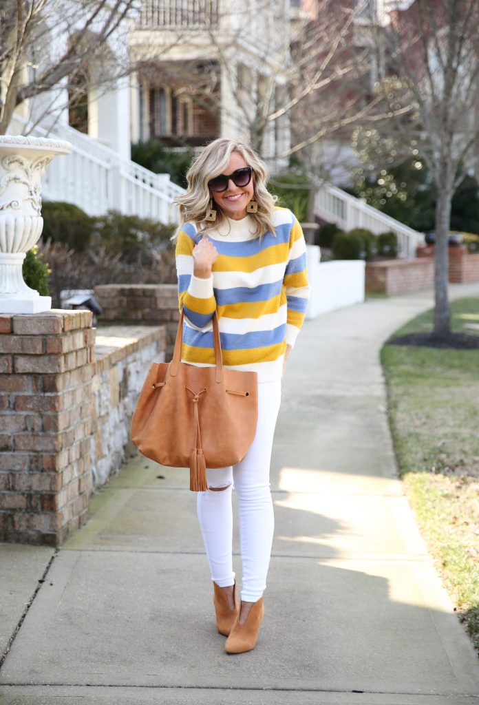 Best Small Shops featured by top US life and style blog Hello! Happiness; Image of a woman wearing a Gunny Sack and Co striped sweater, Vince Camuto booties and white skinny jeans.