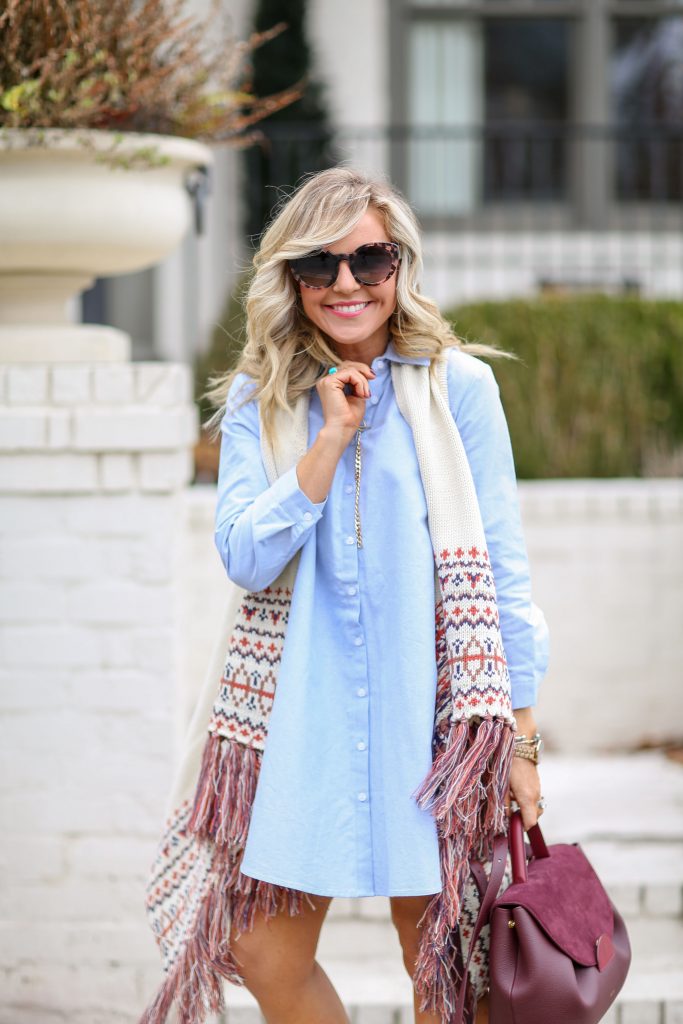 Cute Spring Dresses featured by top US fashion blog Hello! Happiness; Image of a woman wearing BB Dakota dress, Jude Nordic fringe vest, ABLE heels, Luna sunglasses and Polene bag.